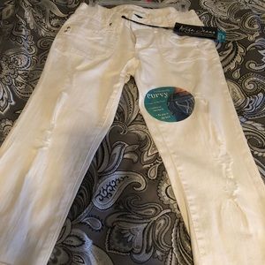 All white ripped design Capri pants new with tag